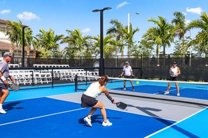 people playing a racquet sport